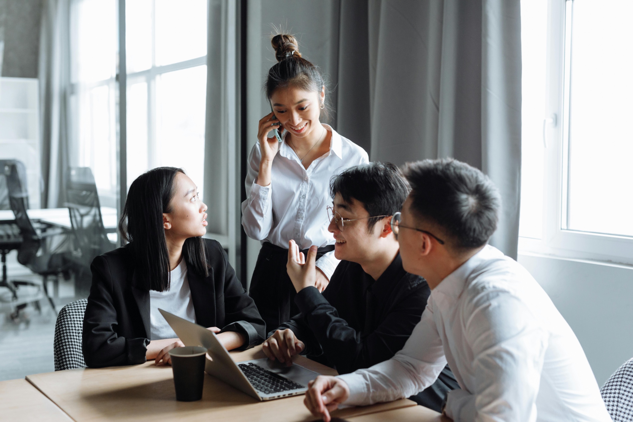 Office environment with people working